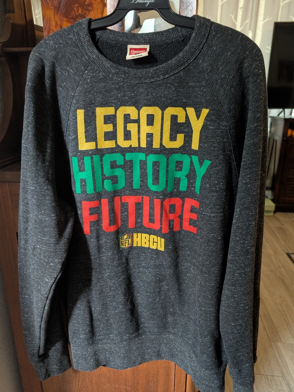 HOMAGE Black Crewneck Sweatshirt with Yellow, Green & Red Lettering